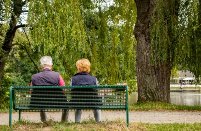 older couple on park bench